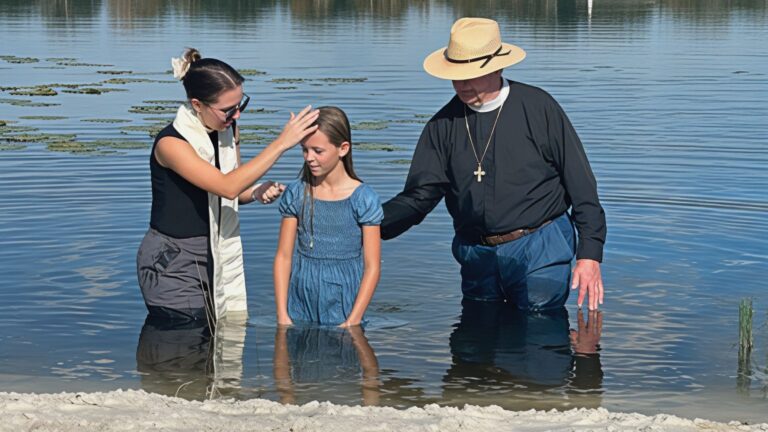 Annual Parish Fish Fry Becomes Setting for 7 Baptisms